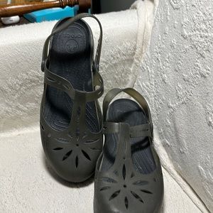 Gray Crocs sandals; cut out embellishment; back strap; feminine Crocs!